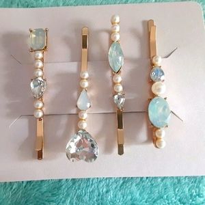 Brand new pearl & rhinestone barrettes